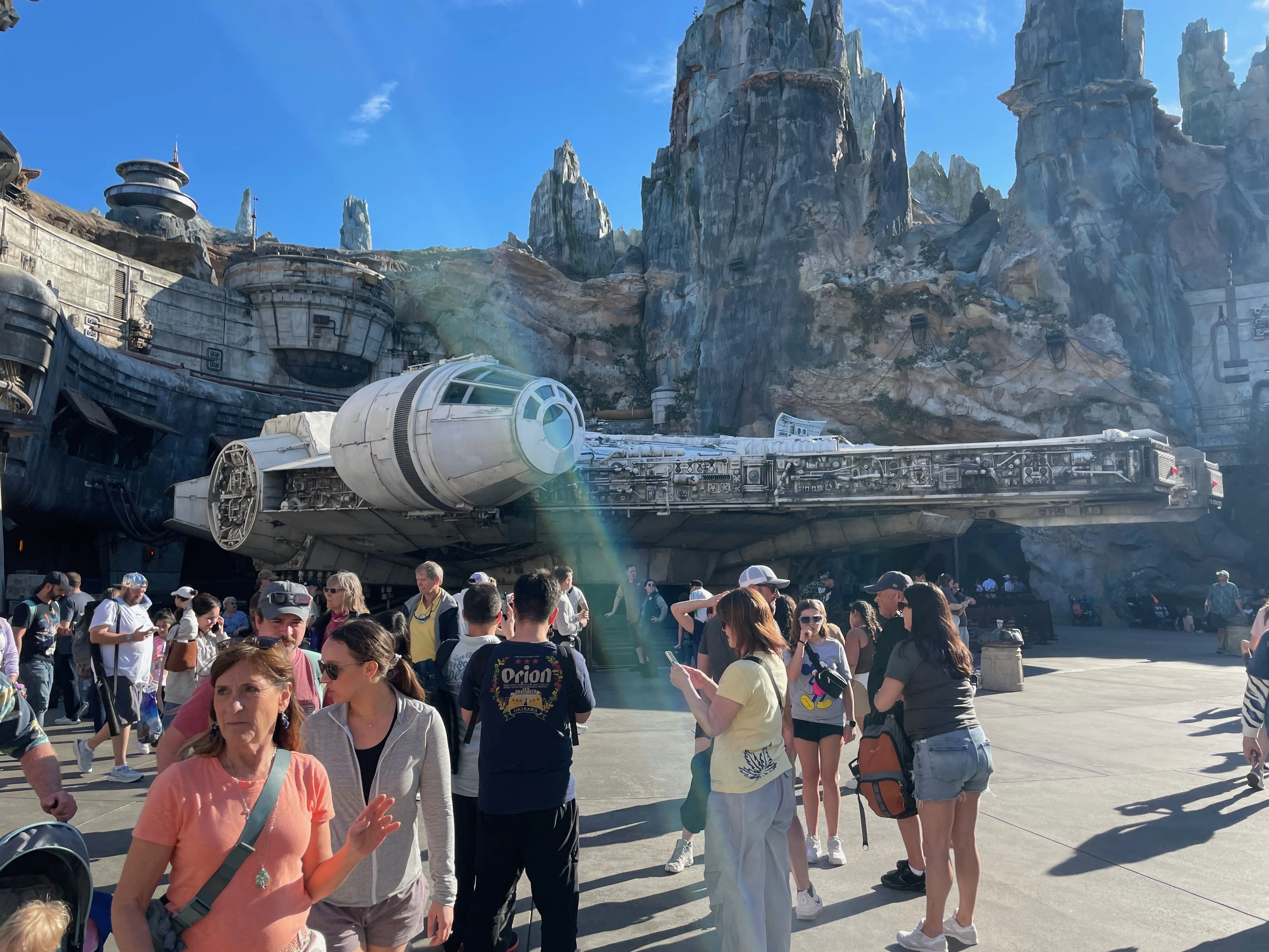 UK family using cooling towels and seeking shade at Disney World during hot summer weather